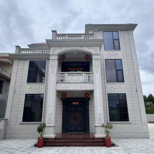 绵阳 芝麻白石材别墅干挂案例展示